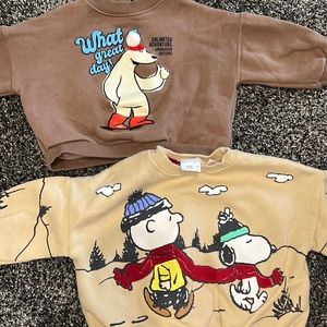 Zara holiday sweaters - one is Charlie Brown